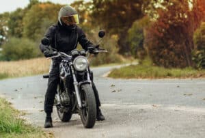Image of a man sitting on a motorcycle